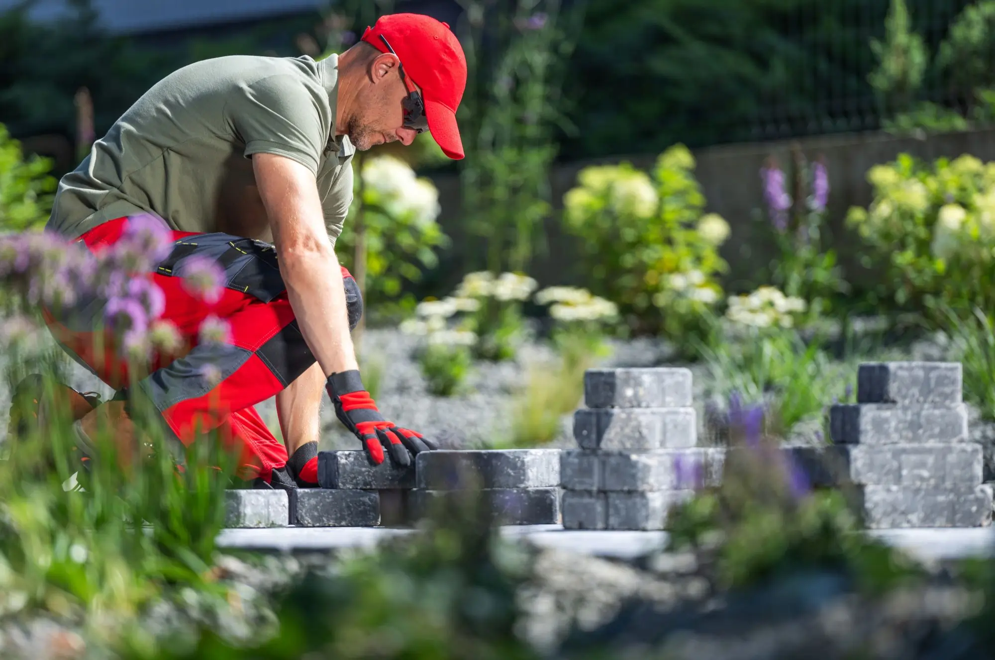retaining wall with patio hardscaping elements on a sloped landscape showing structural and decorative features