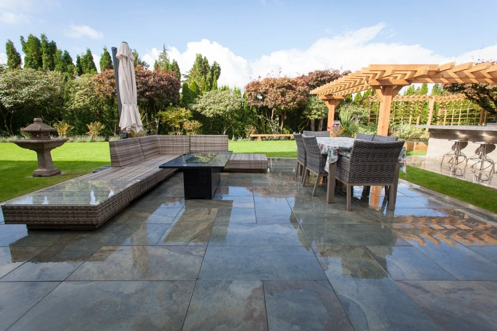 Custom outdoor kitchen and living area