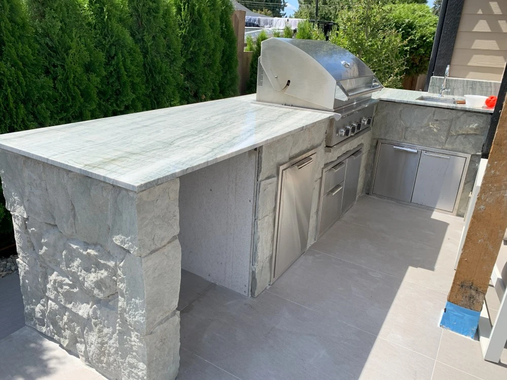 Custom outdoor kitchen with BBQ grill