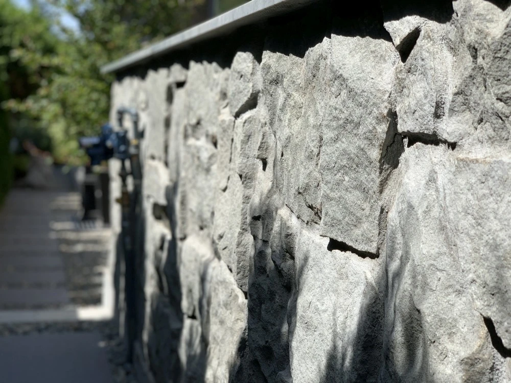 Close-up of grey rock retaining wall in Vancouver