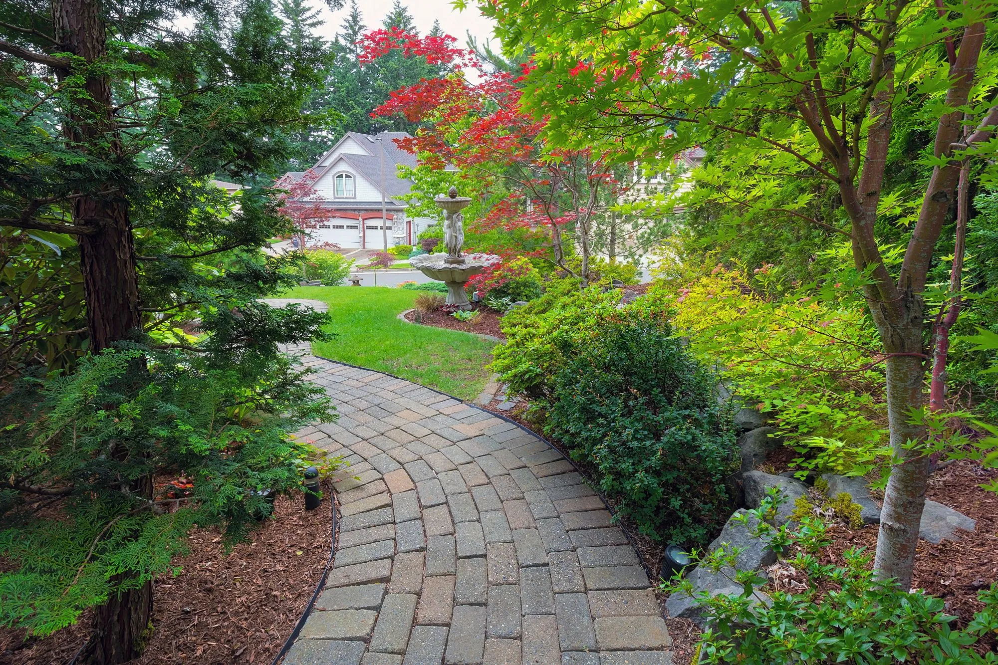damaged patio and pavers from poor drainage in a Vancouver yard
