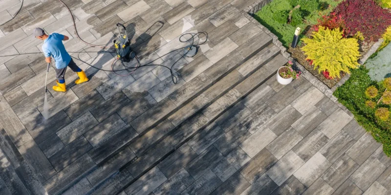 Preventing moss and algae buildup on Vancouver hardscaped surfaces