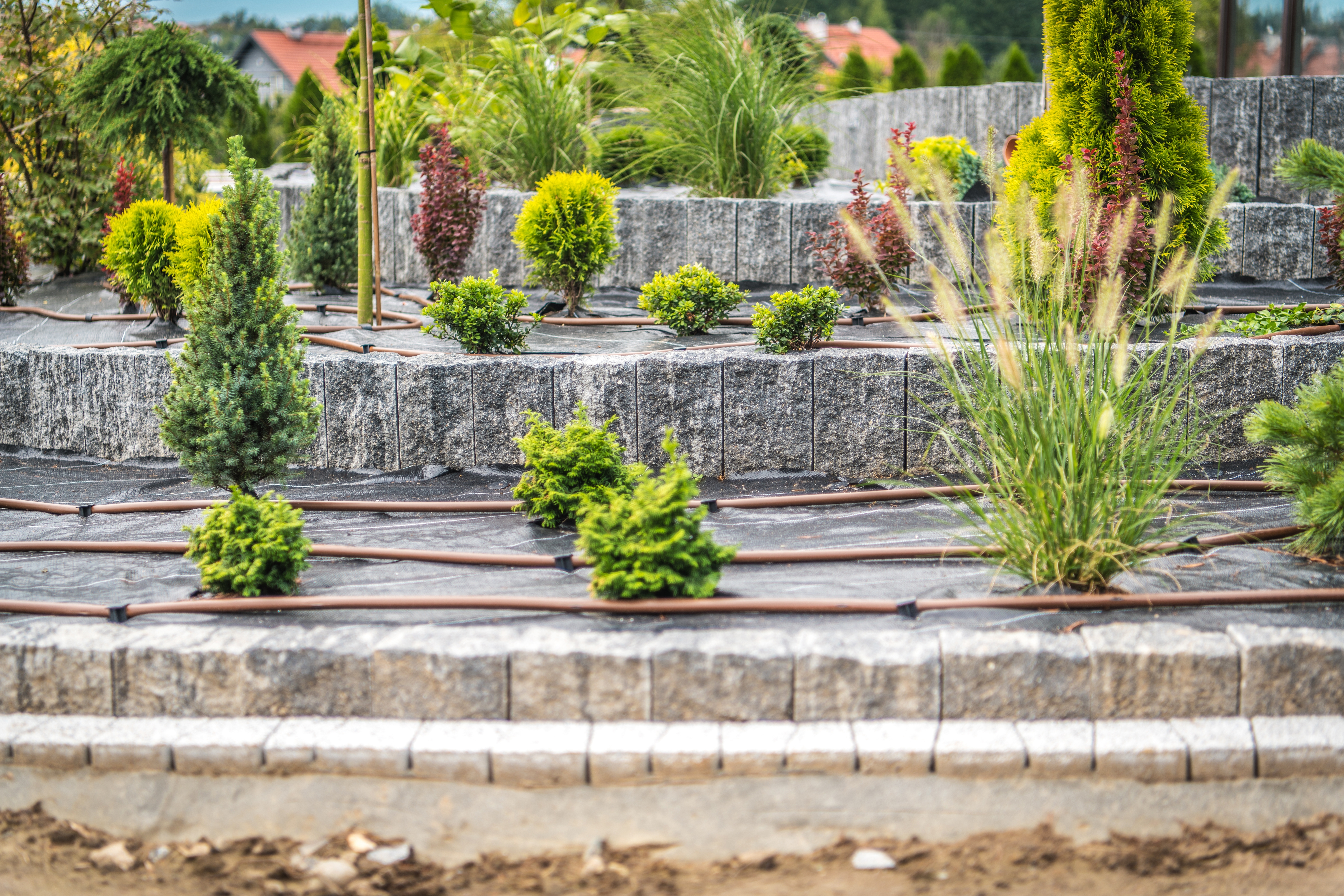 Seasonal hardscape maintenance for patios and retaining walls in Vancouver