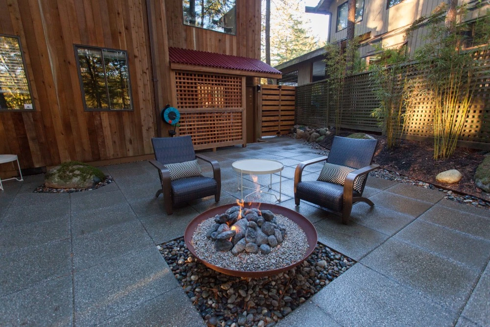 fire-pit-construction Custom fire pit integrated into patio seating area