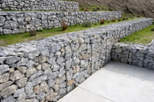 Retaining wall construction project in Vancouver showing excavation and wall installation